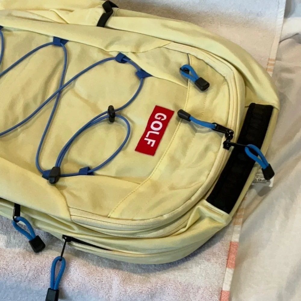 Yellow Golf Backpack with Blue Accents